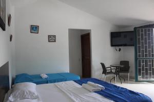 Postel nebo postele na pokoji v ubytování Quinta Baroe