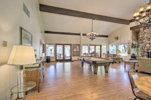 a living room with a pool table in it at Condo with Mtn Views, Balcony and Hot Tub Access! in Sedona