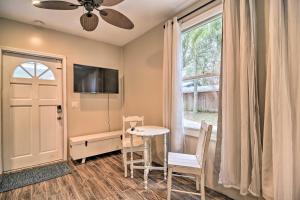 a dining room with a table and chairs and a window at Ozona Studio with Shared Deck - Steps to Gulf! in Palm Harbor
