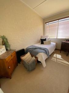 Krevet ili kreveti u jedinici u okviru objekta Location cottage with industrial touch