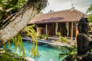 Bazén v ubytování Bramasa Ubud Guest House nebo v jeho okolí
