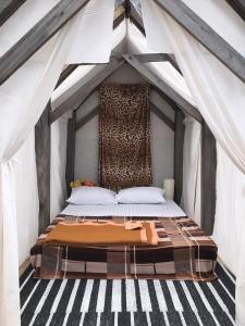 Giường trong phòng chung tại Terre Terrace Glamping - Doichang