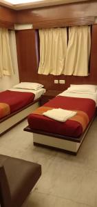 Postel nebo postele na pokoji v ubytování Hotel Aston + 16 fotografií