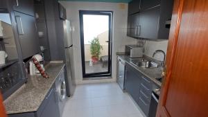 Kuchyň nebo kuchyňský kout v ubytování Apartamentos Spellos en Malpica