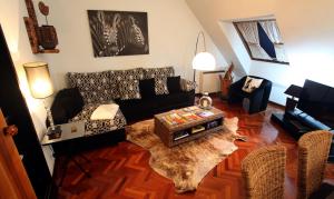 Posezení v ubytování Apartamentos Spellos en Malpica