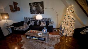 Posezení v ubytování Apartamentos Spellos en Malpica