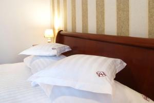 Katil atau katil-katil dalam bilik di Hotel Moldavia