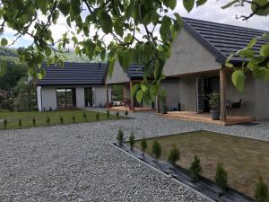 Vonkajšia záhrada v ubytovaní Lepaszówka całoroczny domek nr1