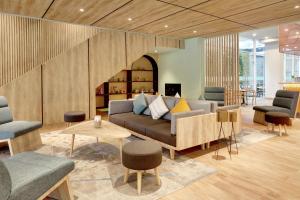 Istumisnurk majutusasutuses ibis Styles Bogor Pajajaran