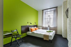 Cama o camas de una habitación en Station Hotel M19