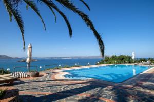 The swimming pool at or close to Studio Thea - Roxan Residence