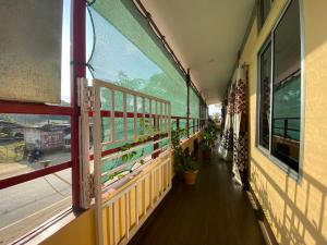 A balcony or terrace at APURBA GUEST HOUSE