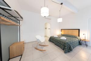 Posteľ alebo postele v izbe v ubytovaní Via Siena 4 - Suites & Rooms
