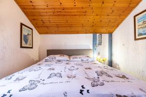 Postel nebo postele na pokoji v ubytování Holiday Home Cohar
