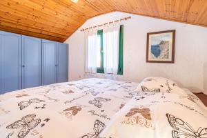 Postel nebo postele na pokoji v ubytování Holiday Home Cohar