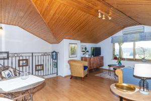 TV a/nebo společenská místnost v ubytování Holiday Home Cohar