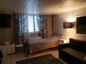Postel nebo postele na pokoji v ubytování Guest House Vanttaus