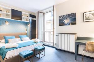 A bed or beds in a room at Cosy Studio Brera & Moscova!