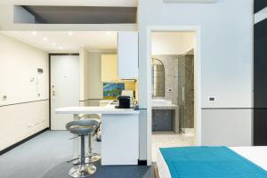 A bed or beds in a room at Cosy Studio Brera & Moscova!