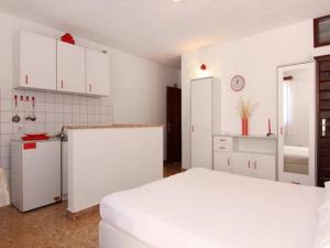 Η κουζίνα ή μικρή κουζίνα στο Apartments Nadia