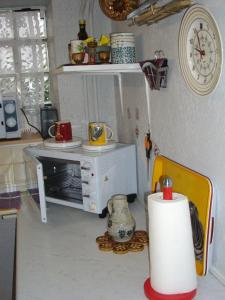 A cozinha ou cozinha compacta de Chez Faby and Sand