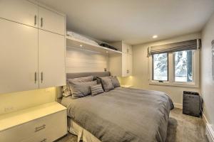 a bedroom with a bed and a window at Ski-InandOut Sun Valley Condo First-Floor Unit! in Ketchum