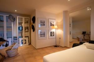 A bed or beds in a room at Studio Thea - Roxan Residence