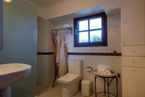 A bathroom at Studio Thea - Roxan Residence