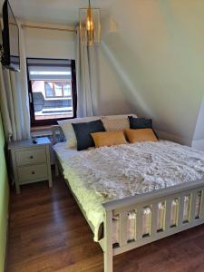 Кровать или кровати в номере Apartament Stanisława