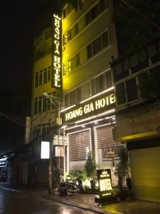 a building with a sign for a hong ga ga hotel at Hoàng Gia Hotel Nhân Hòa in Hanoi