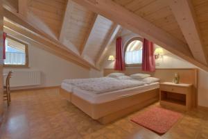 Postel nebo postele na pokoji v ubytování Garni Oskar Appartments