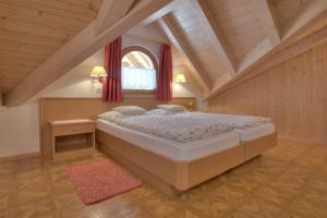 Postel nebo postele na pokoji v ubytování Garni Oskar Appartments