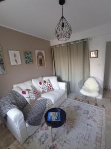 Una cama o camas en una habitación de Maison Bohème Vesubie
