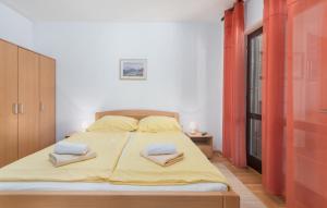 Ένα ή περισσότερα κρεβάτια σε δωμάτιο στο Anitavilla Poreč Apartments with Pool +27 φωτογραφίες