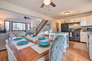 a kitchen and living room with a table and chairs at 4 Mi to Tobyhanna State Park Home with Fire Pit in Tobyhanna