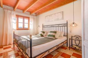 Postel nebo postele na pokoji v ubytování Villa Ses Porrasses