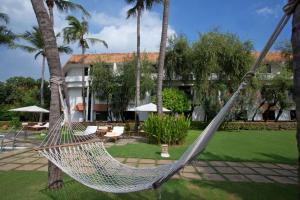 a hammock in the courtyard of a resort at Trident Chennai in Chennai
