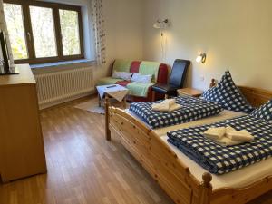 Letto o letti in una camera di Ferienwohnungen Zechmeister