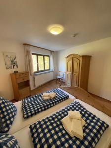 Letto o letti in una camera di Ferienwohnungen Zechmeister