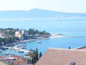 a view of a harbor with boats in the water at Apartments Katalenić in Selce