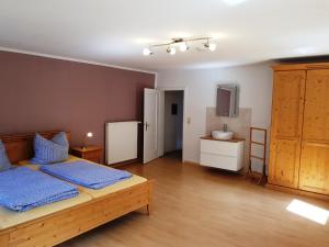 Letto o letti in una camera di Ferienwohnungen Zechmeister