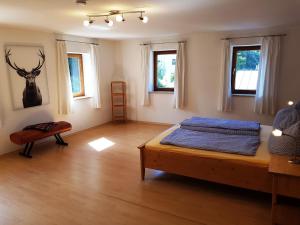 Letto o letti in una camera di Ferienwohnungen Zechmeister