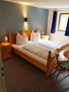 Letto o letti in una camera di Ferienwohnungen Zechmeister