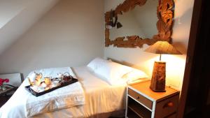 Postel nebo postele na pokoji v ubytování Apartamentos Spellos en Malpica