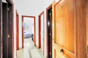 A bed or beds in a room at Cozy space in the heart of Corralejo