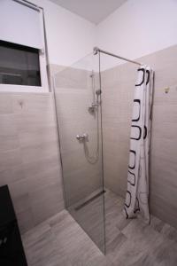 Kúpeľňa v ubytovaní Apartman Darija