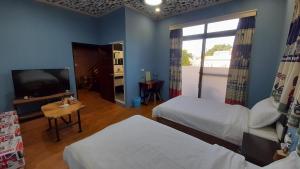 Vuode tai vuoteita majoituspaikassa Woolywo B&B 花蓮縣民宿第2451號