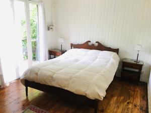 Una cama o camas en una habitación de Verde Lujan Delta