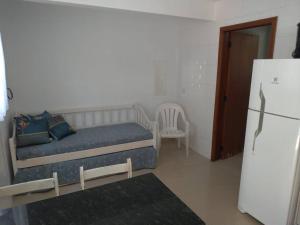 Nhà bếp/bếp nhỏ tại Casa agradável em Camboriú com estacionamento no pátio