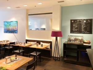 Veitingastaður eða matsölustaður á Boutique Hotel NI-MO